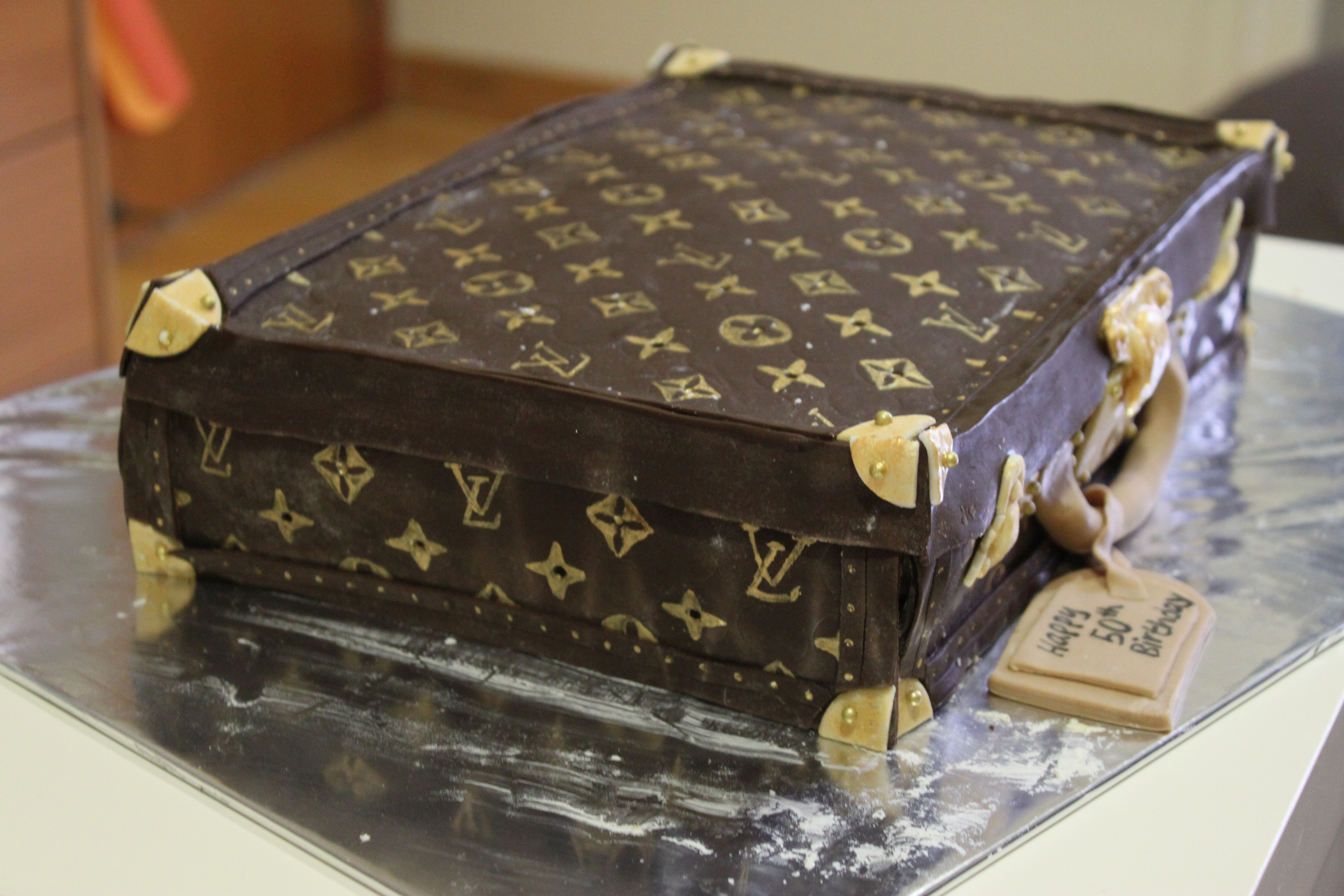 LOUIS VUITTON Suitcase Cake - Decorated Cake by D Cake - CakesDecor